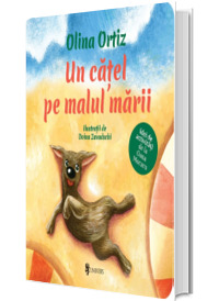 Un catel pe malul marii